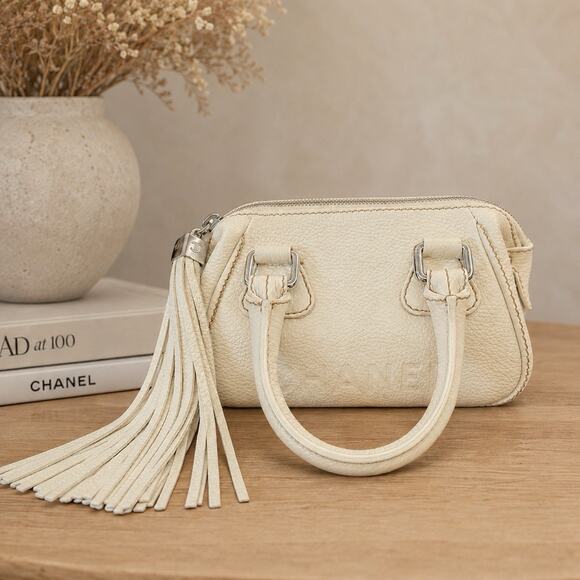 CHANEL Handbags - Chanel LAX Small Bowler Cream Pebbled Leather Silver Tassel 2003